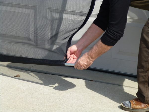 Garage door screen pouch