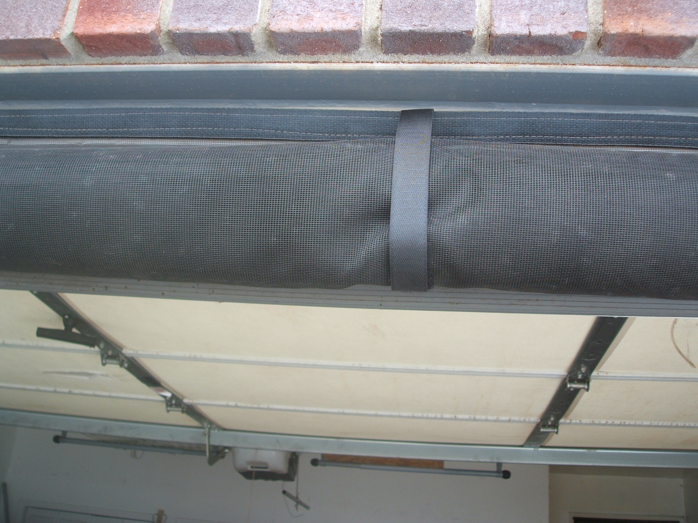 Garage door screen rolled up