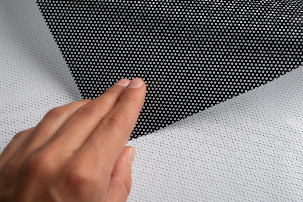 Screen for angled garage doors